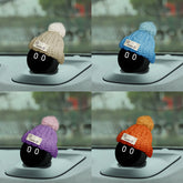 Hats of different colors give NOMI different personalities.